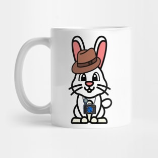 Funny bunny is holding a camera Mug